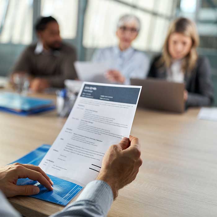 Person presenting their CV in an interview